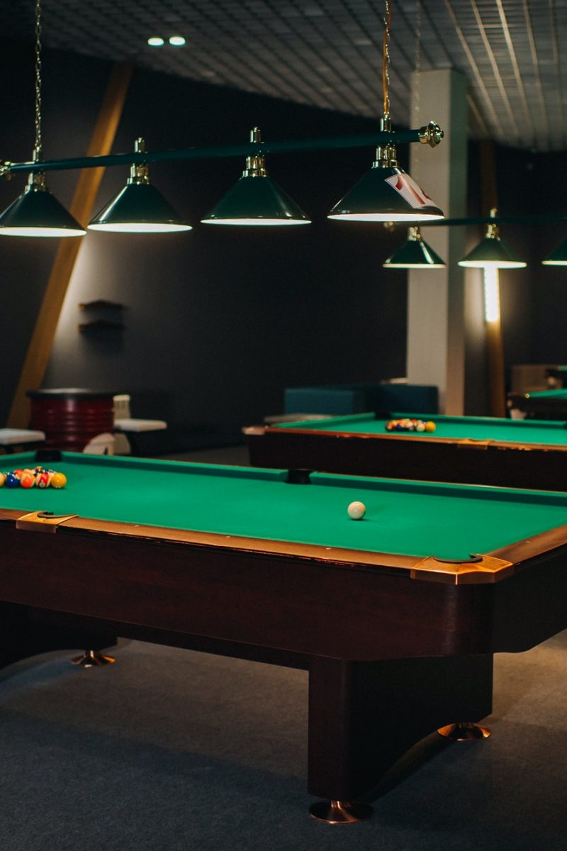 billiard-table-with-green-surface-and-balls-in-the-billiard-club-pool-game-5.jpg